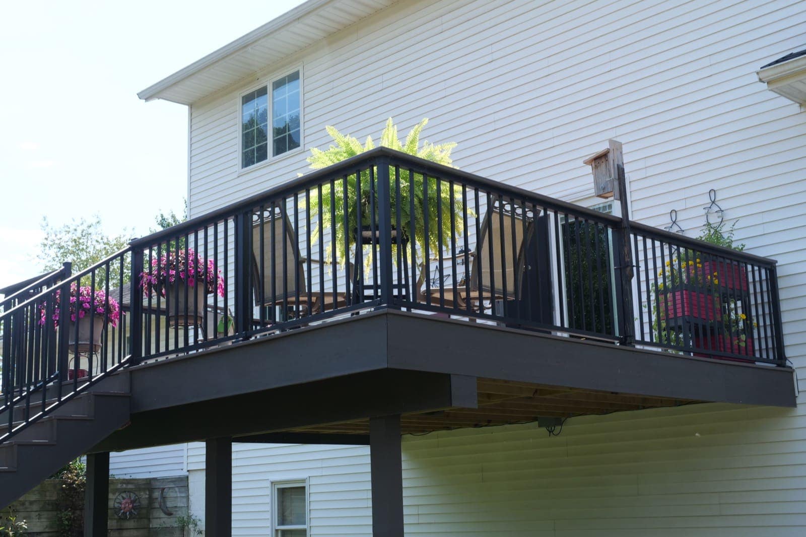 Black aluminum deck railing installed on a composite deck in Warsaw, Indiana