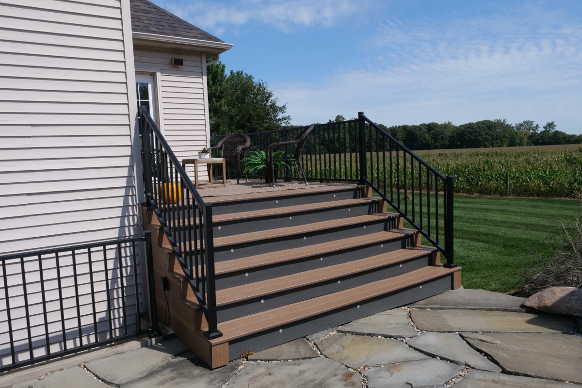 Composite deck with black aluminum stair railing, Kosciusko County Indiana
