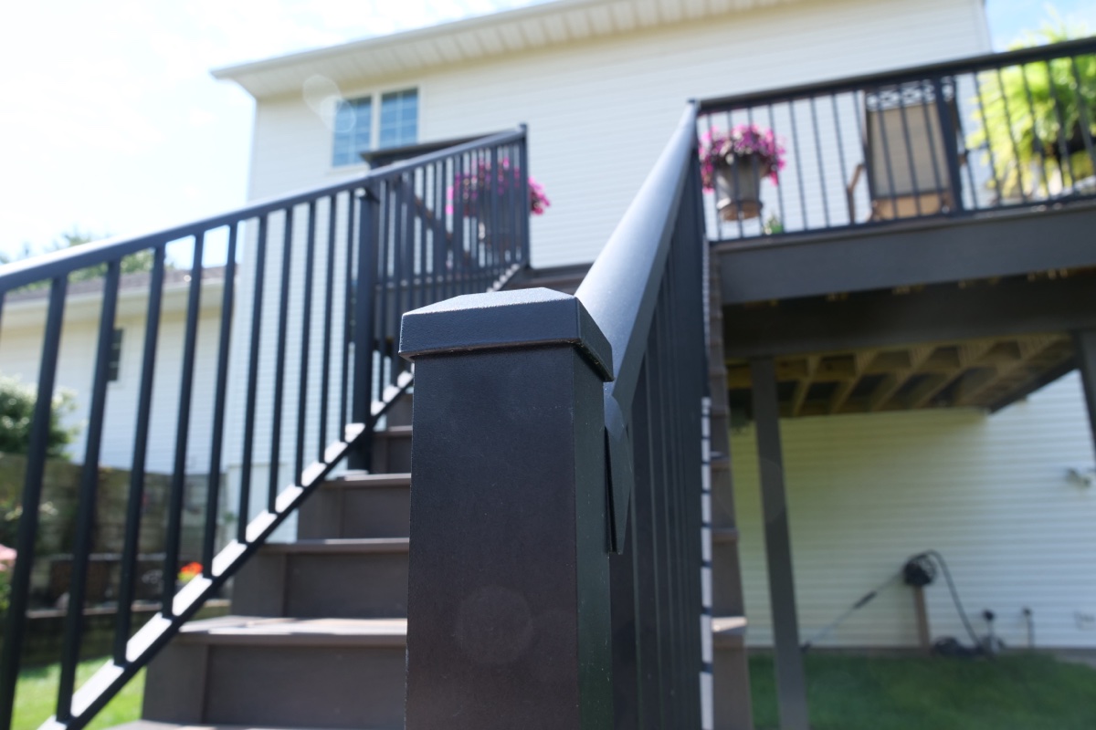 Black aluminum stair railing post detail on composite deck, Kosciusko County Indiana